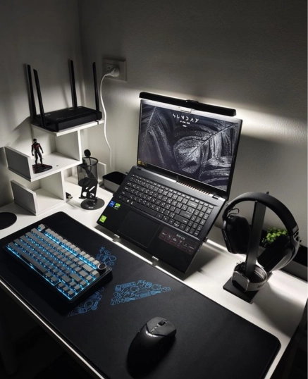 Modern home office setup with laptop, mechanical keyboard, headphones, and desk accessories – freelance digital marketing consultant in Malappuram